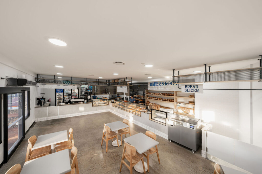 Coastal charm and industrial chic, custom joinery and signage and separate gluten free area for this hospitality fit out for The Bakers Room, Total Fitouts Wide Bay