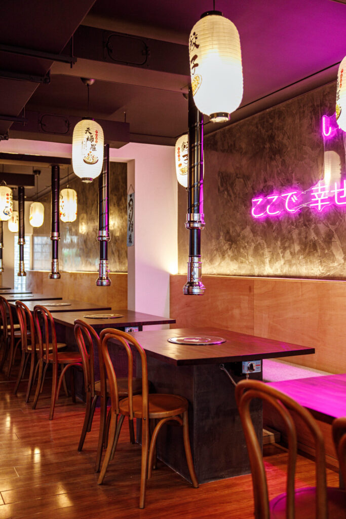 Raw timber accents, timber wall, Japanese-style timber wall lighting and LED lighting for this commercial hospitality fit out for Kyo Yakiniku, Total Fitouts Sydney South East